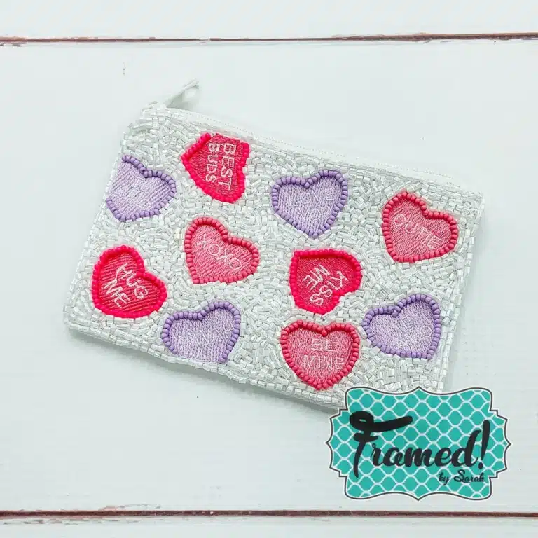 small beaded zipper pouch with back background and pink and purple conversation hearts - Galentine's Day Gifts Framed by Sarah