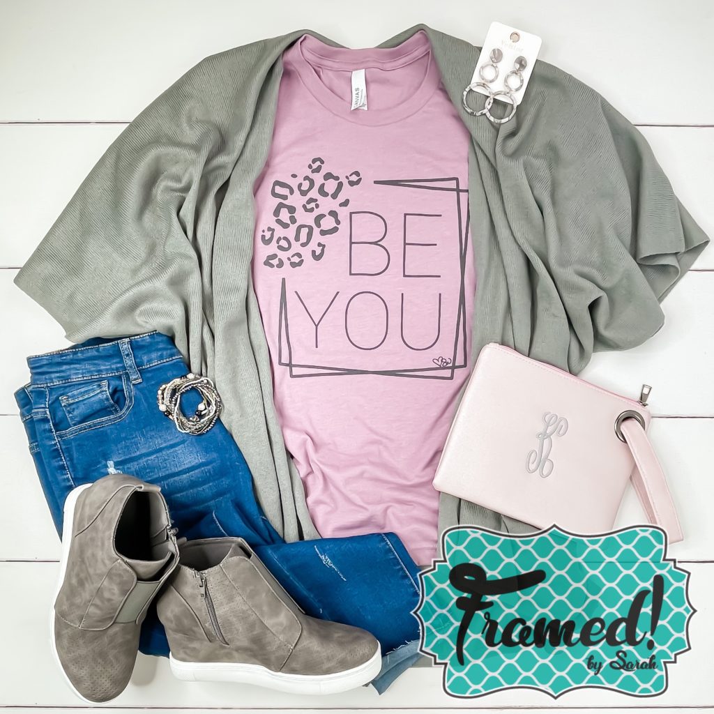 Lilac "Be You" tshirt styled with a light gray kimono style cardigan, jeans, and gray wedge sneakers