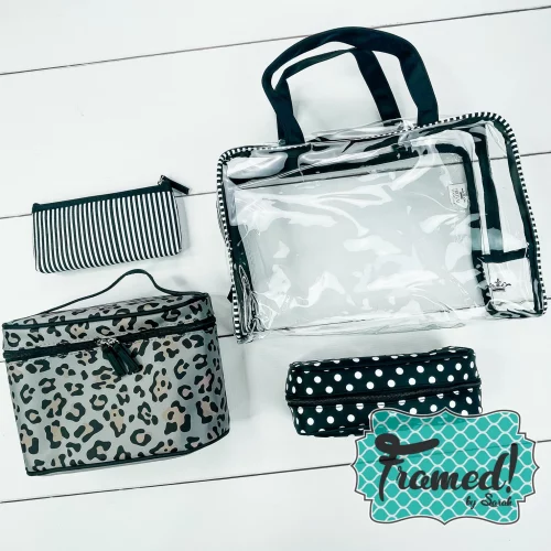 4 leopard print and clear travel bags displayed on a white background