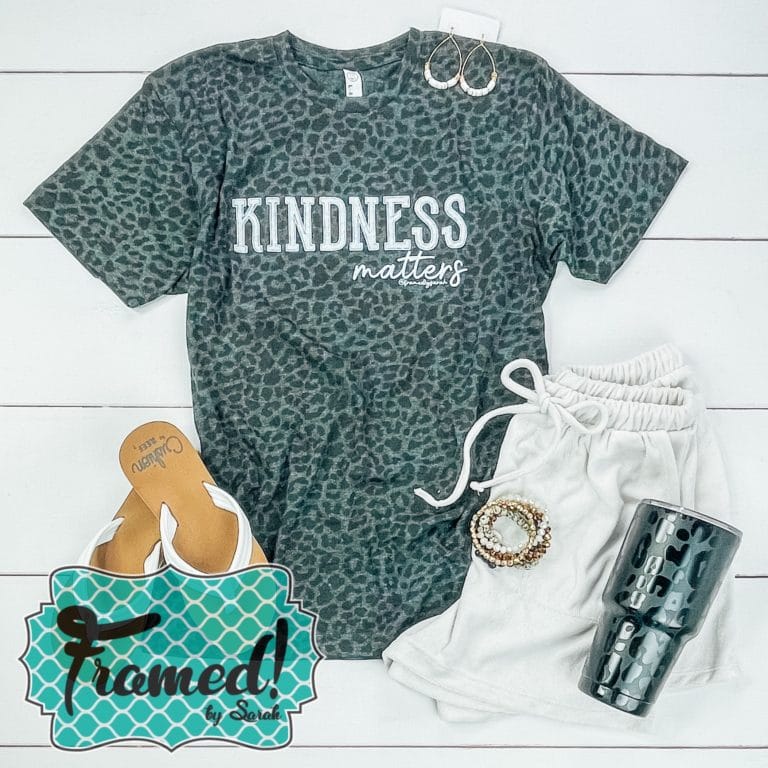 Leopard print Kindness Matters T-shirt Club Tee styled with white terry cloth shorts and a xl black leopard print tumbler