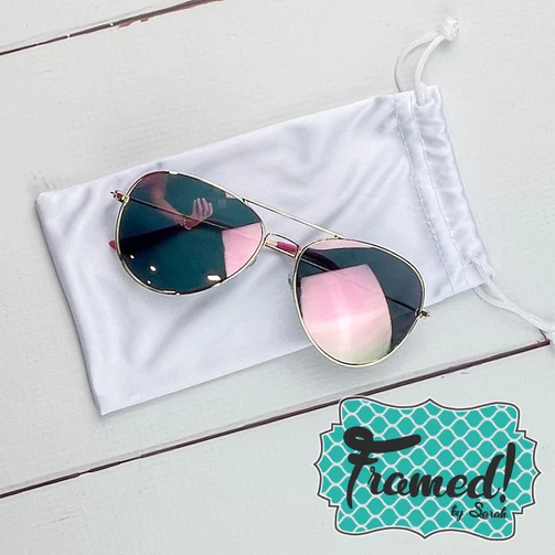 Pink Aviator sunglasses with white fabric pouch