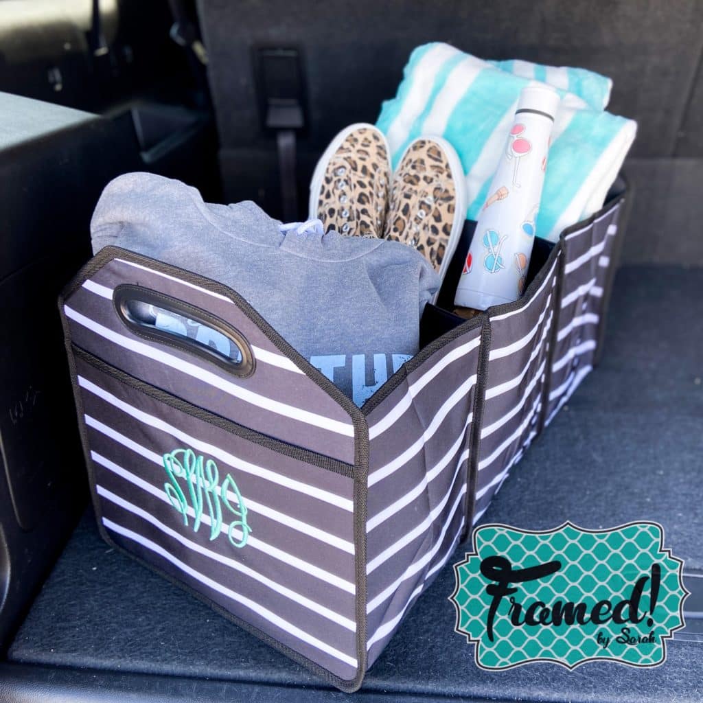 Black and white car trunk organizer in the back of the car