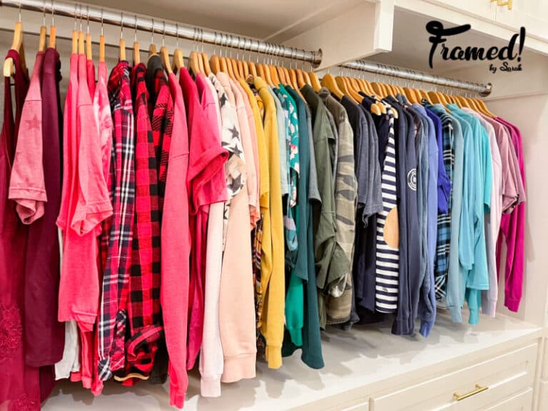 Colorful section of my closet with a full row of tshirts organized by color