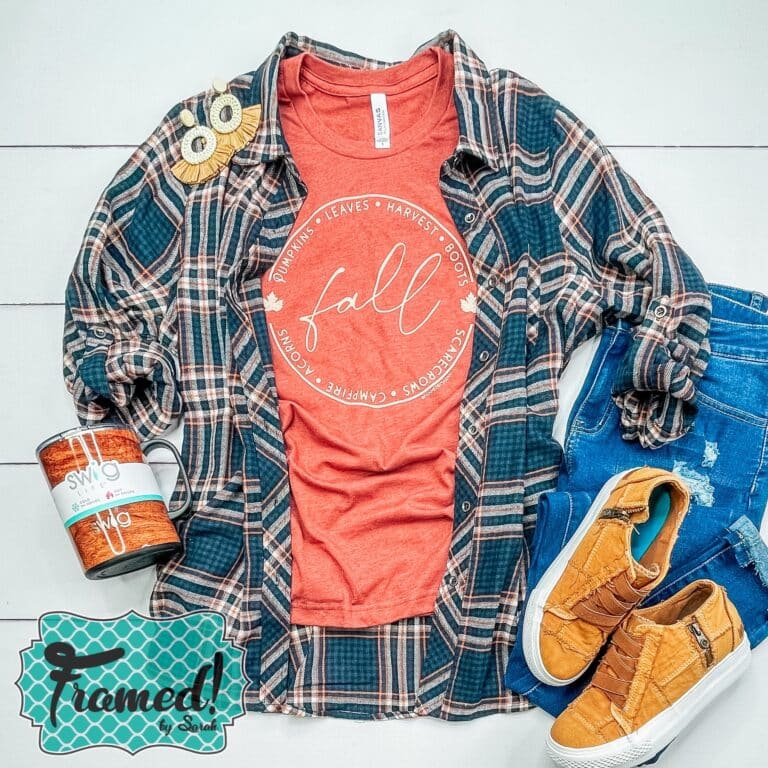 orange Fall tshirt styled with a blue plaid tee, camel sneakers, and jeans