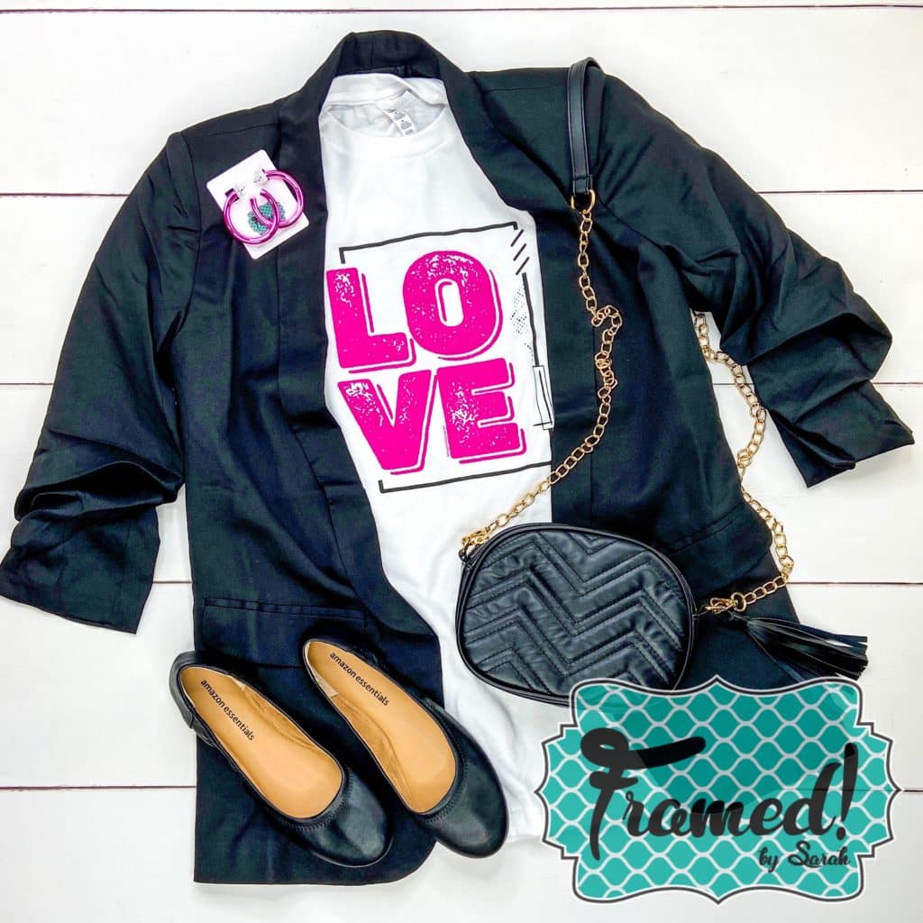 white "love" graphic tee styled with a black blazer, ballet flats and purse