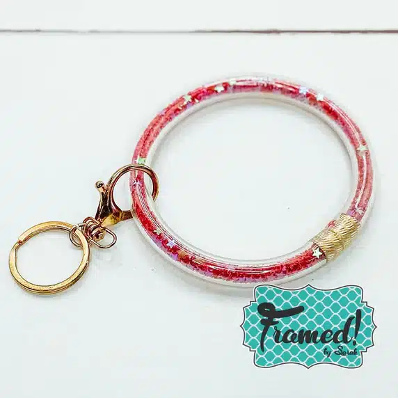 red glitter filled bracelet keychain