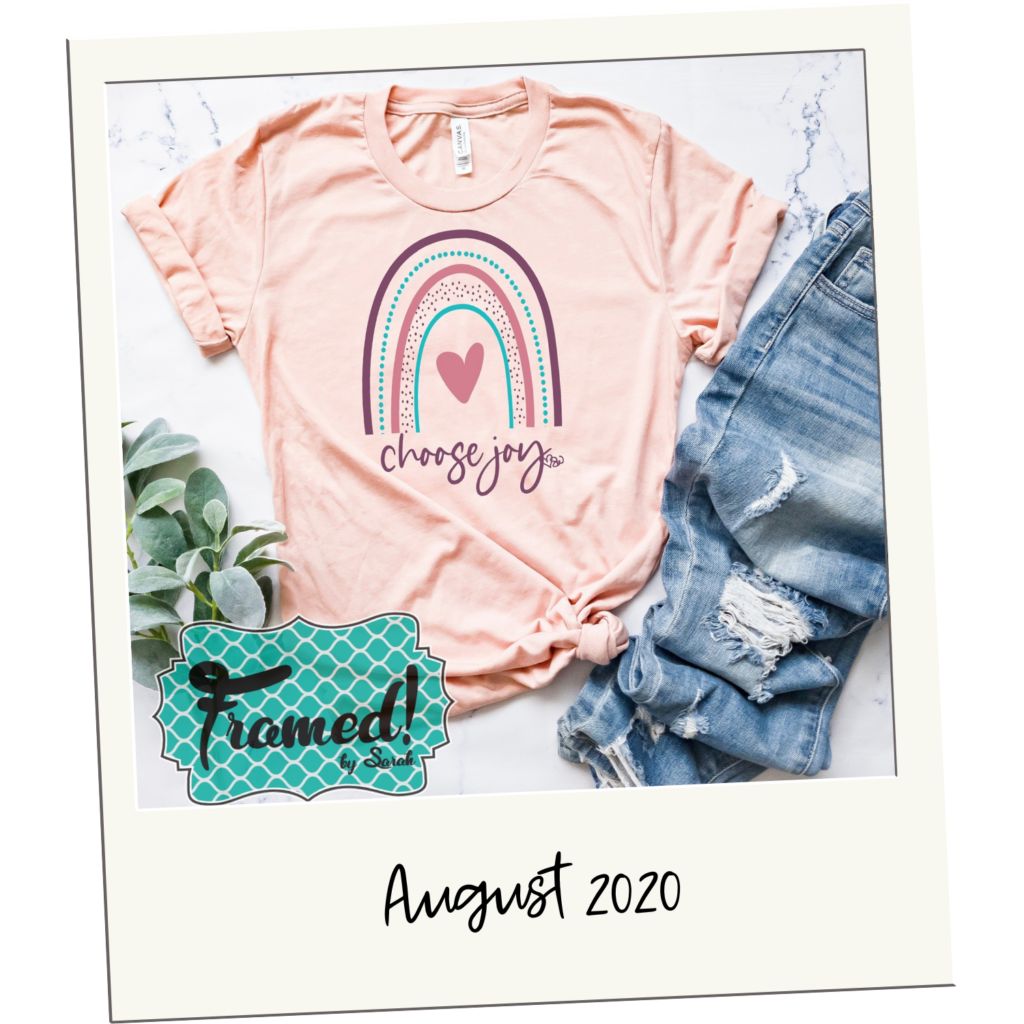 Polaroid of a pale pink "choose Joy" shirt and a rainbow "August 2021"