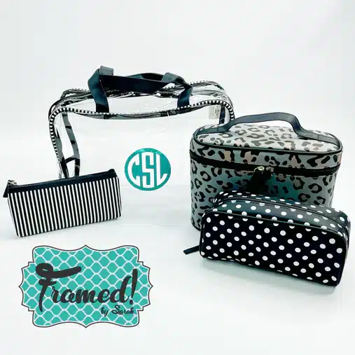 4 leopard print and clear travel bags displayed on a white background. The largest clear bag has a round "CSL" monogram on the front in teal
