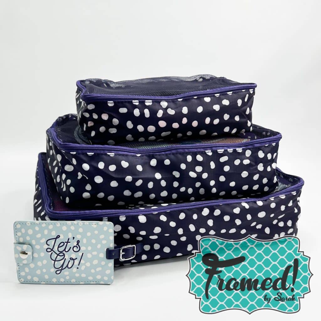 stacked 3 piece packing cube set. Navy with white polka dots.