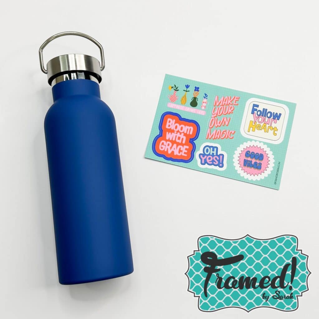 Navy blue water bottle and a paper of stickers.