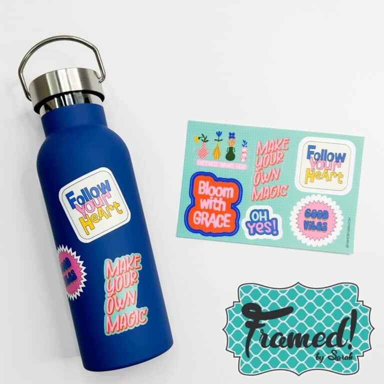 Navy blue water bottle with stickers on the bottle and a paper of stickers.