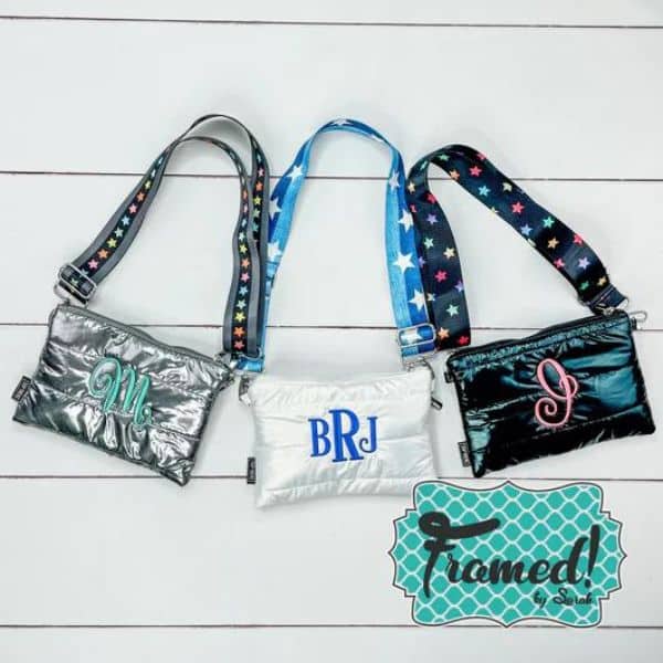 3 Puffer Convertible Bags. One gray with a turquoise monogram, one white with a blue monogram, one black with a pink monogram