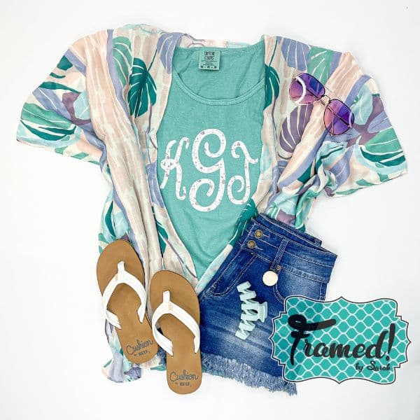 Pastel leaf print kimono styled with turquoise monogrammed tank, jeans shorts, sunglasses, and white sandals