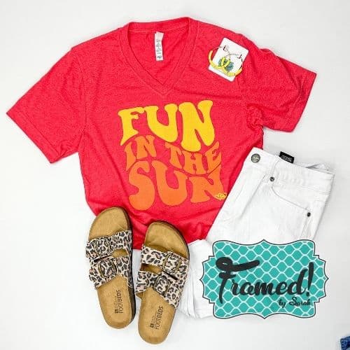 Red "Fun in the Sun" graphic tee styled with white distressed denim, leopard sandals, yellow hoop earrings