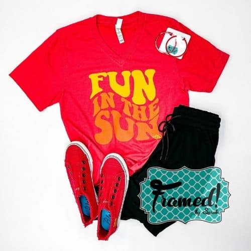 Red "Fun in the Sun" graphic tee styled with black drawstring Jogger pants, red slide on sneakers, and hoop earrings