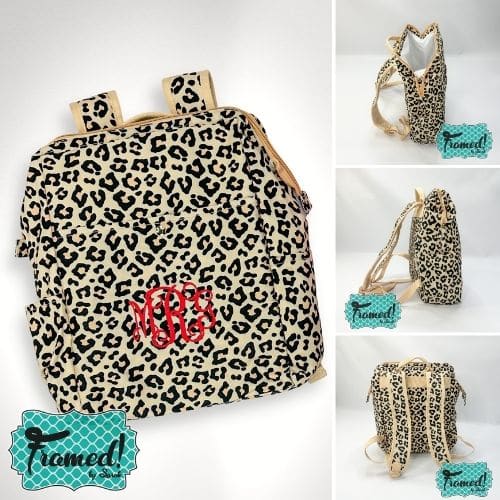 Leopard backpack with red monogram.