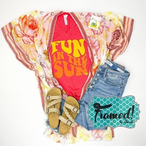 Red "Fun in the Sun" graphic tee styled with jeans, tan sandals, yellow and red floral print kimono, hoop earrings