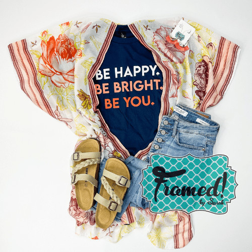 be happy. be bright. be you. navy tee shirt styled with jeans, tan sandals, coral and orange floral kimono, and coral accessories