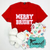 Red Merry and Bright tee styled with holiday pajama pants and fuzzy white slippers