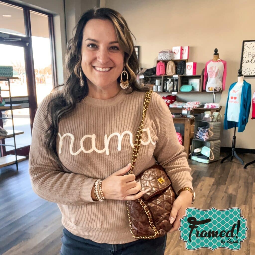 Sarah in Mama Sweater + White Gold Chandelier Earrings + Gold Ivory Bracelet Stack + Brown Chain Shoulder Bag - Up Close