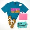 Teal "Sunshine and Tan Lines" t-shirt styled with white jeans, white sandals, beaded hoop earrings, pink channel sticked bag