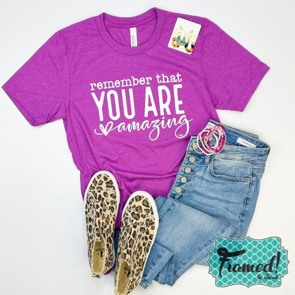 "remember that you are amazing" purple t-shirt styled with jeans and leopard shoes